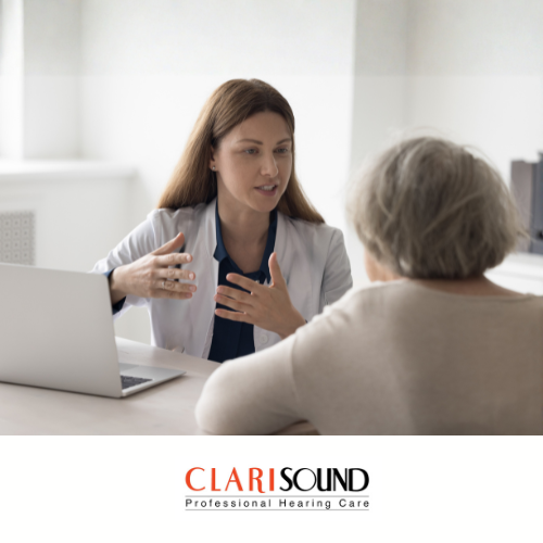 A female doctor speaks to an older woman across a desk with a laptop. The scene promotes CLARISOUND Professional Hearing Care, whose logo appears at the bottom of the image.